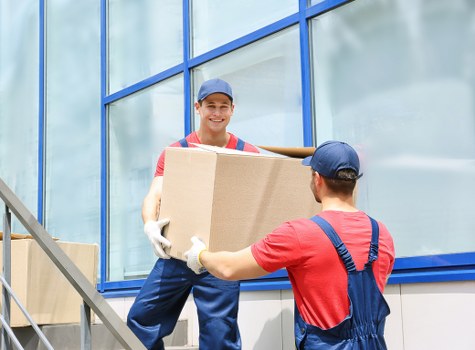 Moving van with packed household items ready for transport