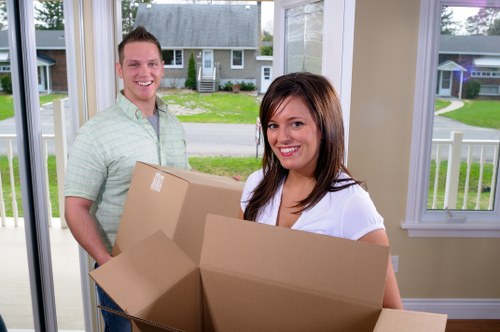 Local Westminster moving team assisting with boxes