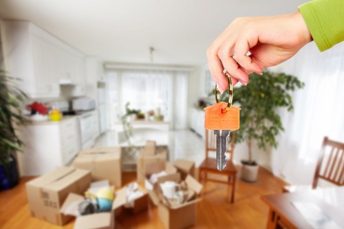 Professional movers handling fragile items in Westminster