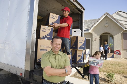 Professional Westminster movers handling boxes during a residential relocation