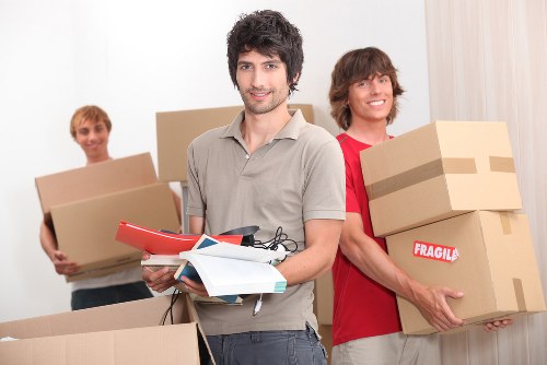 Packed moving boxes and organized transport by Westminster movers