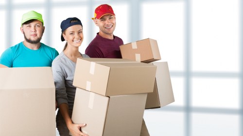 Movers handling a relocation job with safety awareness