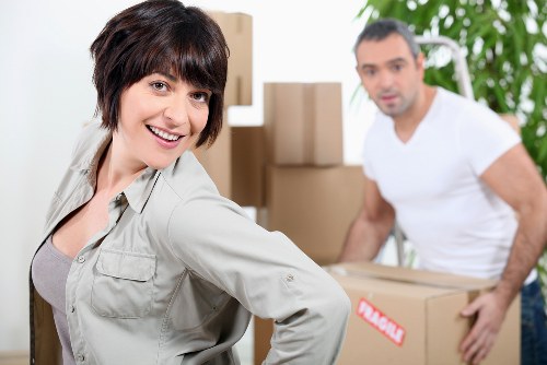 Professional movers loading furniture for a Westminster relocation