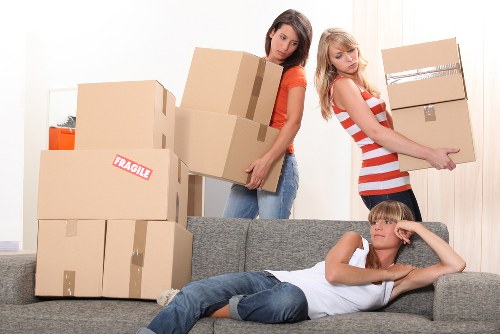 Labelled boxes and packing supplies prepared for a Westminster house move