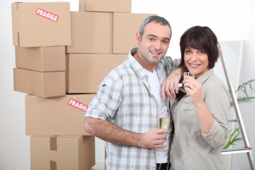 Careful handling of boxes and luggage for a student move in Westminster